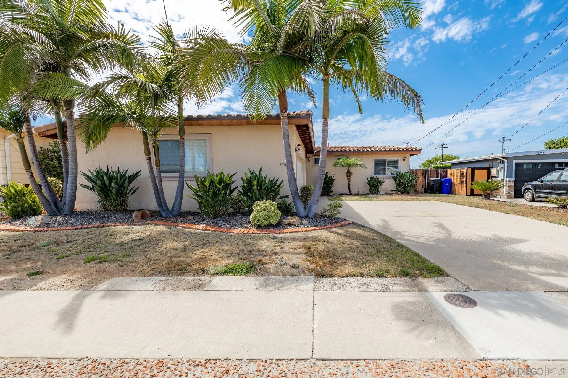 2742 Murray Ridge Road San Diego, CA 92123 - Photo 1 of 34 a view of a park with palm trees