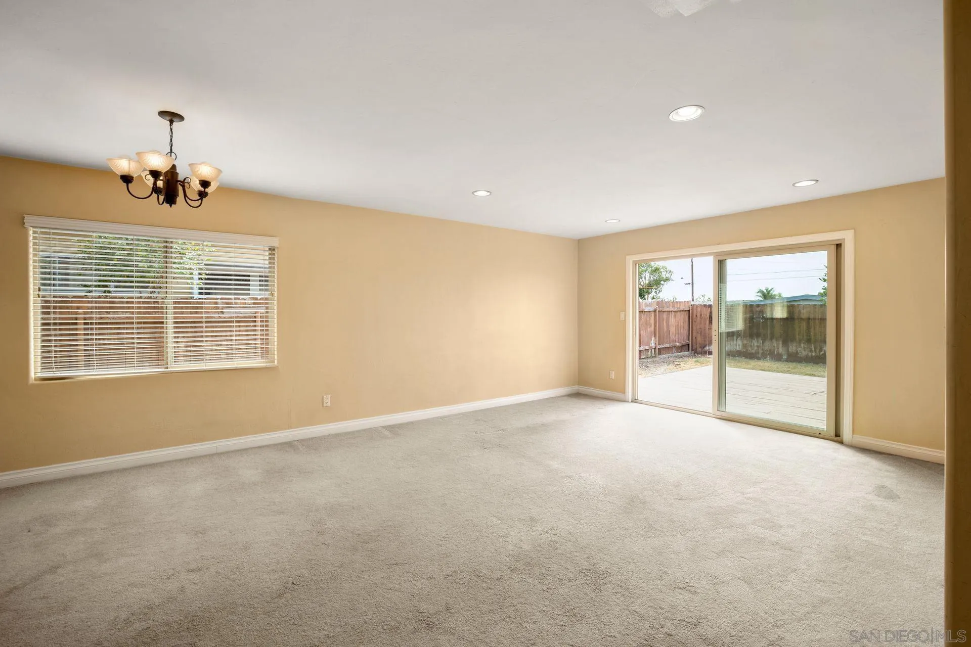 2742 Murray Ridge Road San Diego, CA 92123 - Photo 11 of 34 a view of an empty room with a window