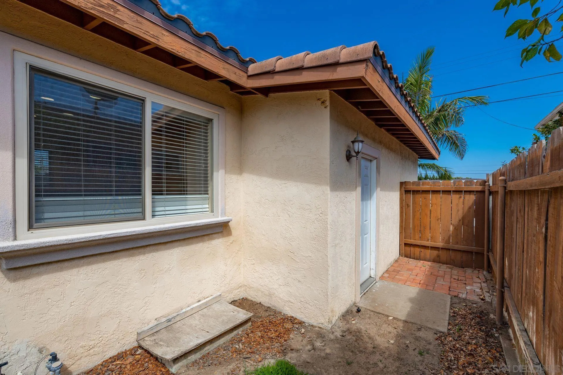 2742 Murray Ridge Road San Diego, CA 92123 - Photo 30 of 34 a house with a window