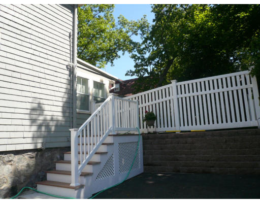 34 Edgemere Road Boston, MA 02132 - Photo 13 of 16 a view of a balcony with wooden floor