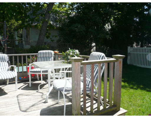34 Edgemere Road Boston, MA 02132 - Photo 16 of 16 a view of balcony with furniture and garden