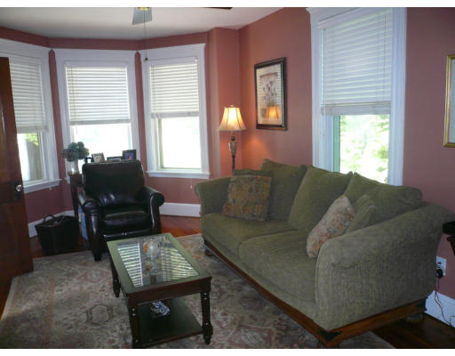 34 Edgemere Road Boston, MA 02132 - Photo 2 of 16 a living room with furniture and a window
