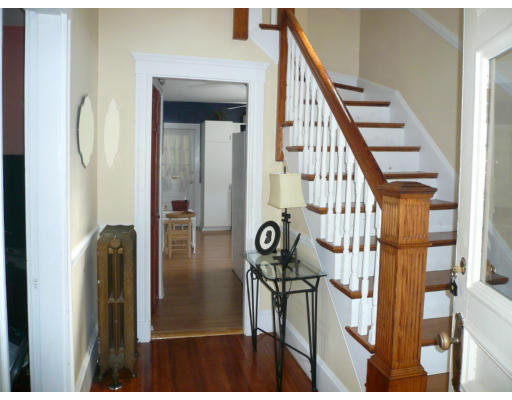 34 Edgemere Road Boston, MA 02132 - Photo 7 of 16 a view of entryway and hall with wooden floor