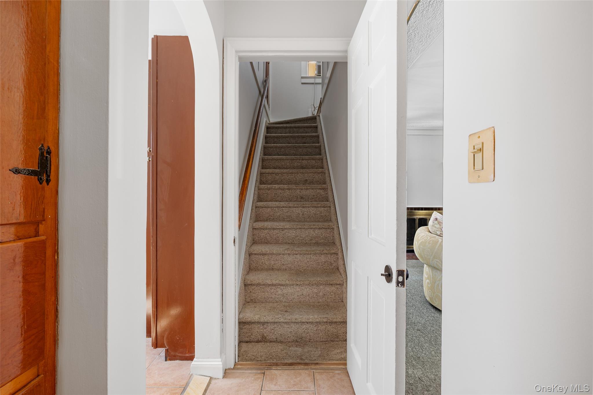 682 Rose Boulevard Baldwin, NY 11510 - Photo 12 of 22 a view of a hallway with wooden floor and entryway