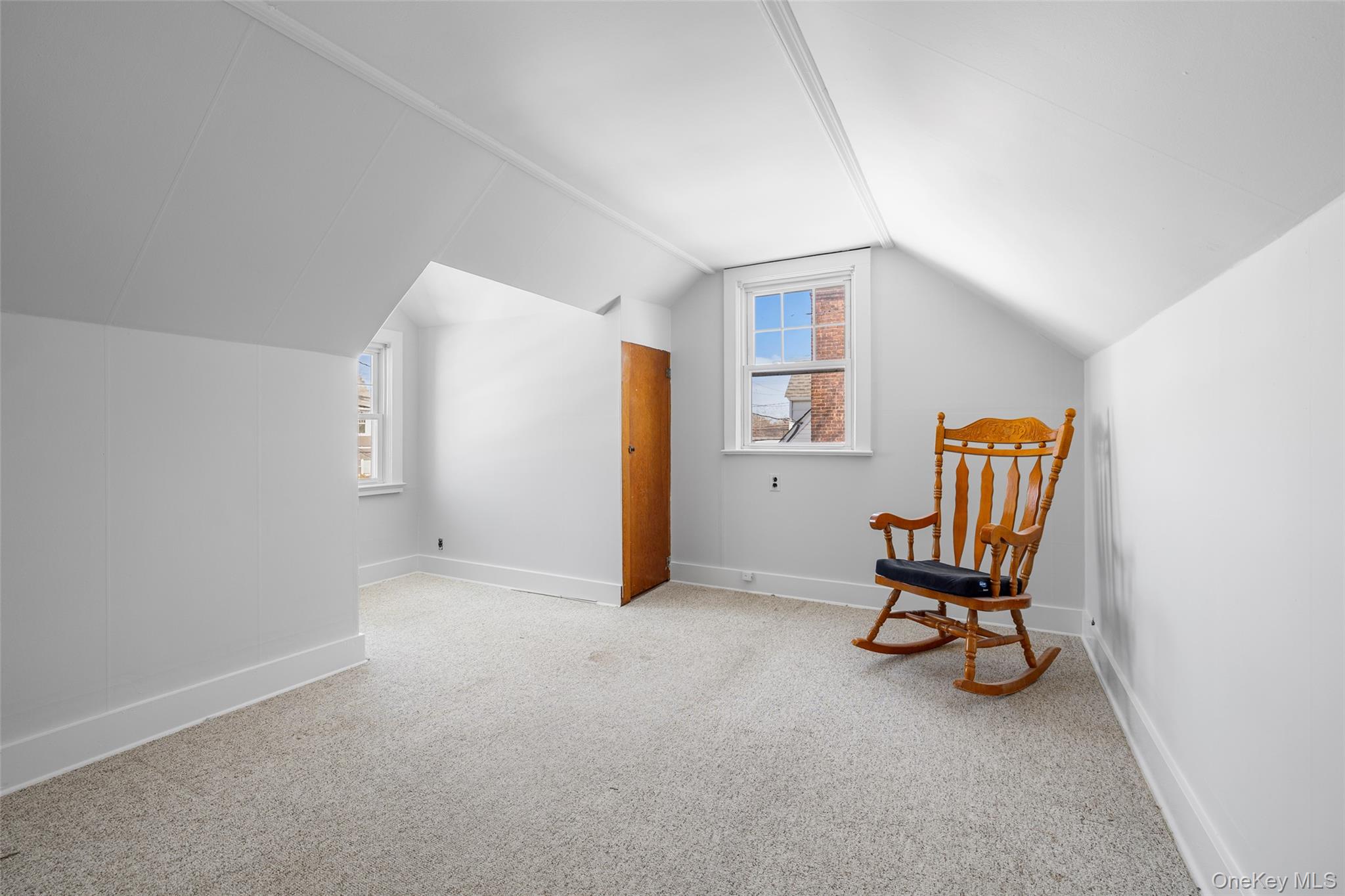 682 Rose Boulevard Baldwin, NY 11510 - Photo 17 of 22 a view of livingroom with furniture and a chair