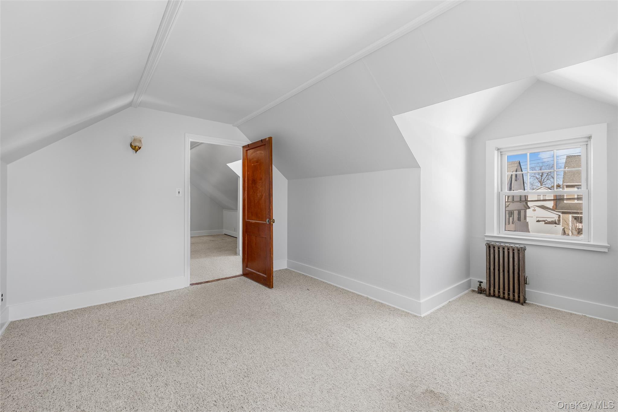 682 Rose Boulevard Baldwin, NY 11510 - Photo 18 of 22 an empty room with windows