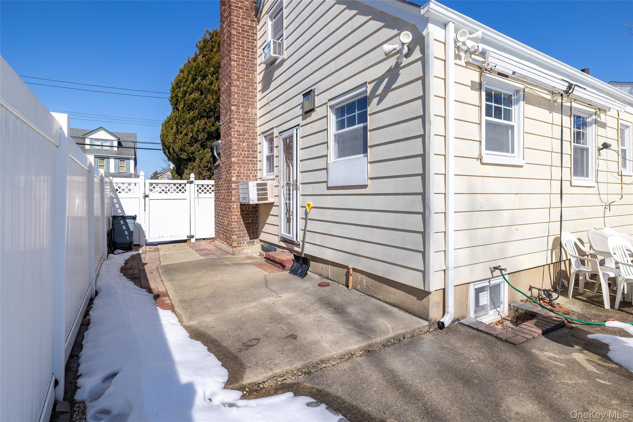 682 Rose Boulevard Baldwin, NY 11510 - Photo 22 of 22 a view of a house with a patio