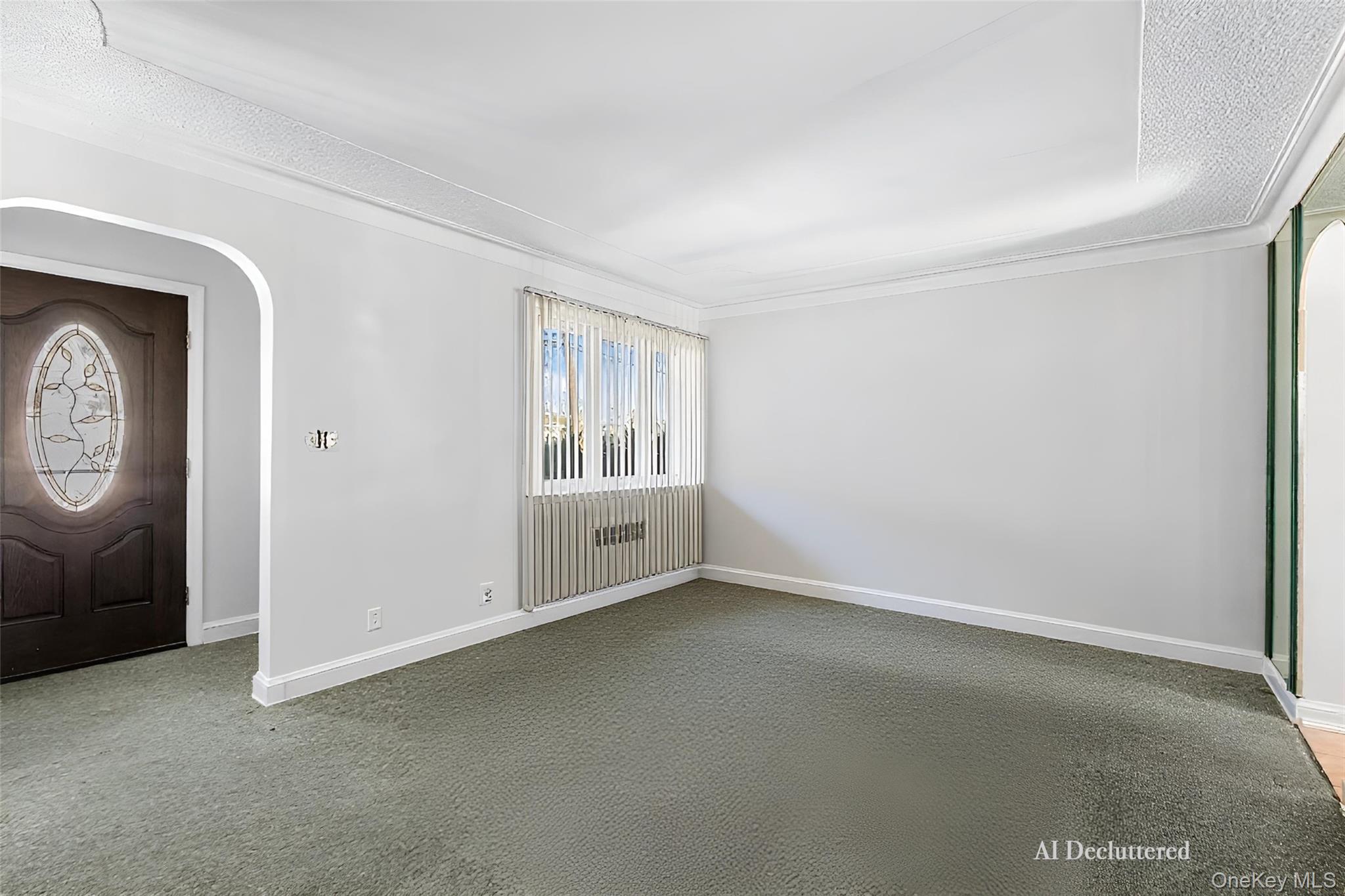 682 Rose Boulevard Baldwin, NY 11510 - Photo 5 of 22 an empty room with windows