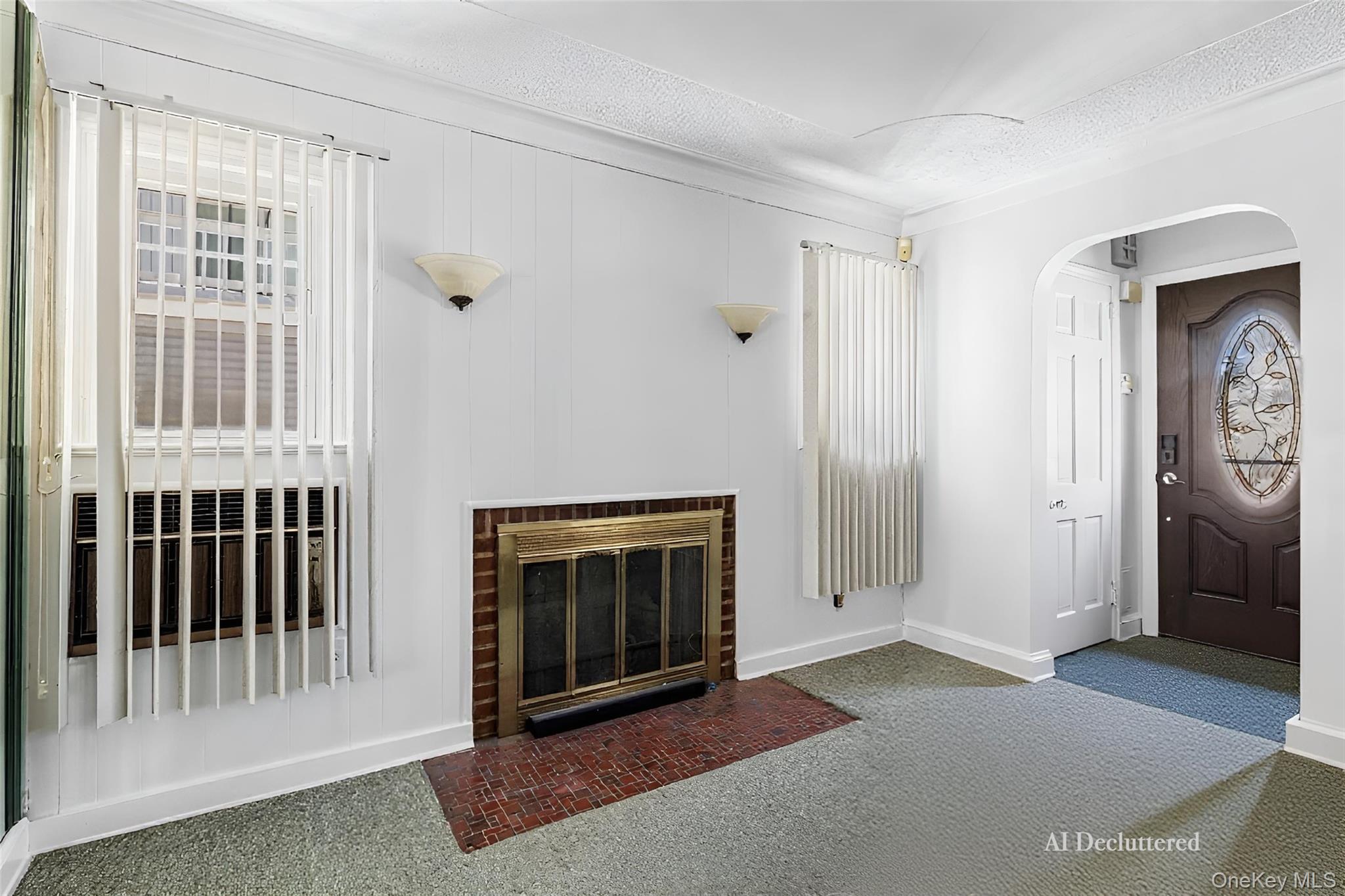 682 Rose Boulevard Baldwin, NY 11510 - Photo 7 of 22 a view of a livingroom with an empty space and a fireplace