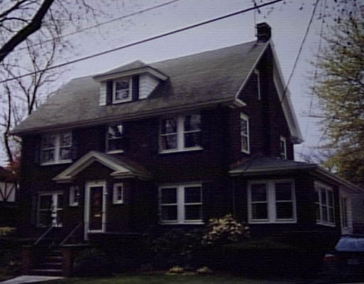 25 Glendale Road Marblehead, MA 01945 - Photo 1 of 1 a front view of a house with a garden