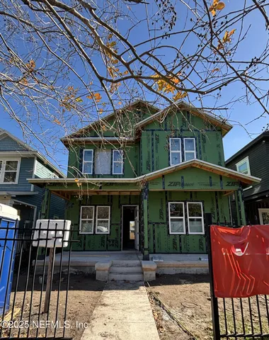 a front view of a house with patio