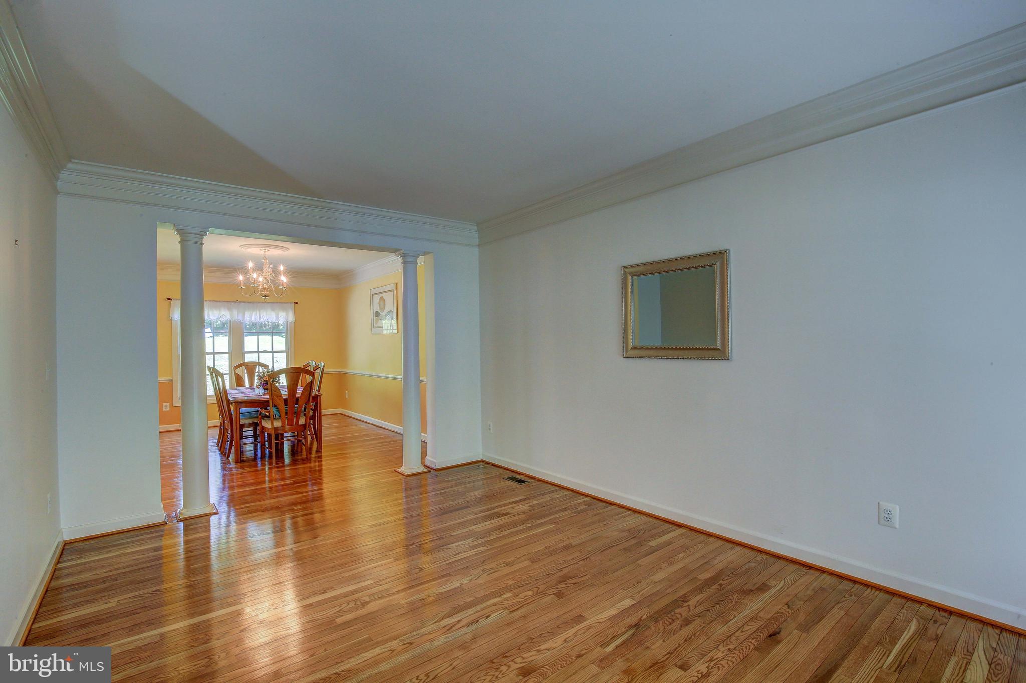 2023 Gresham Lane Davidsonville, MD 21035 - Photo 12 of 58 Gleaming hardwoods in the living room