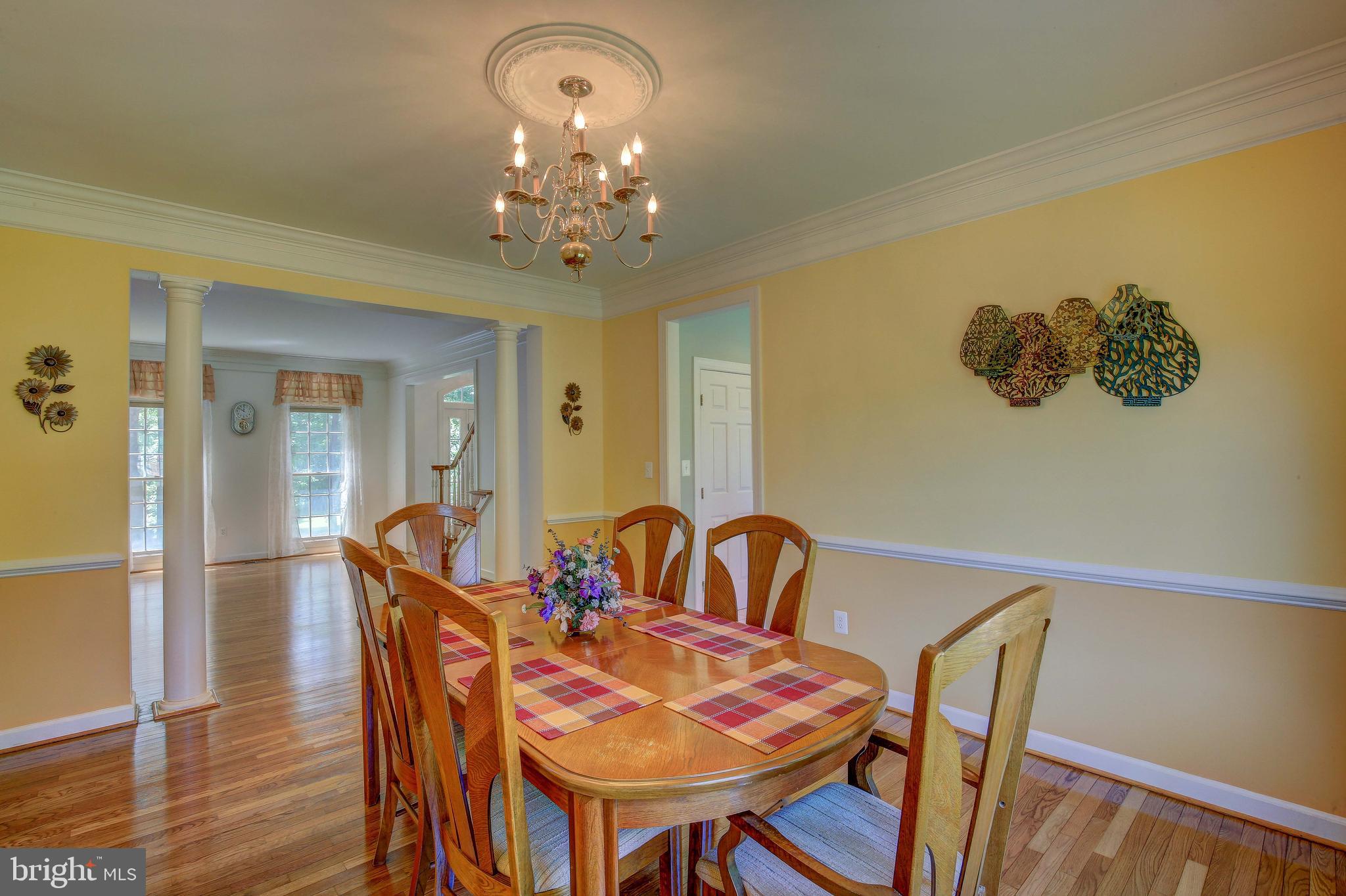 2023 Gresham Lane Davidsonville, MD 21035 - Photo 16 of 58 Traditional dining room with wide crown moulding