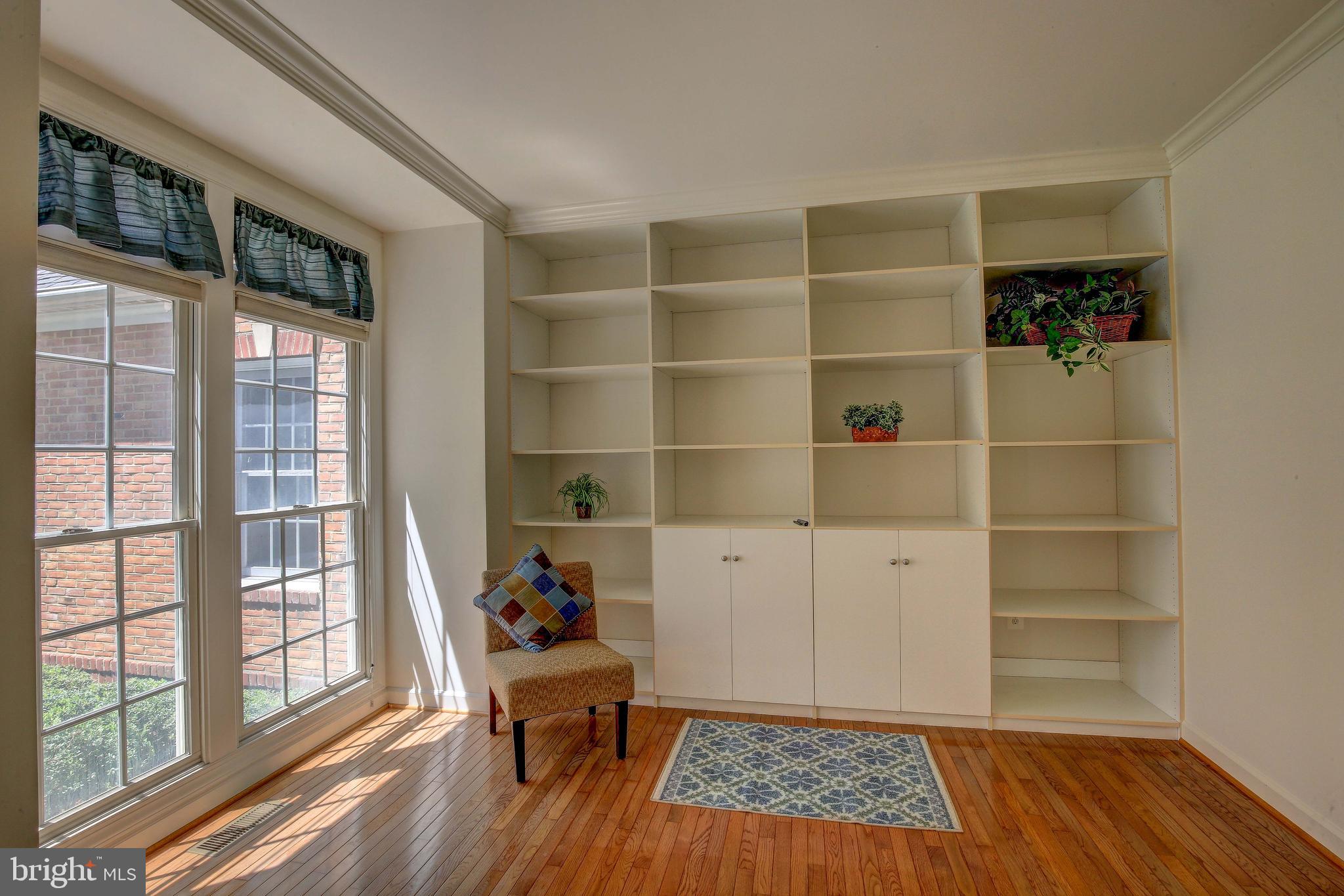 2023 Gresham Lane Davidsonville, MD 21035 - Photo 26 of 58 Built-in shelving in front office