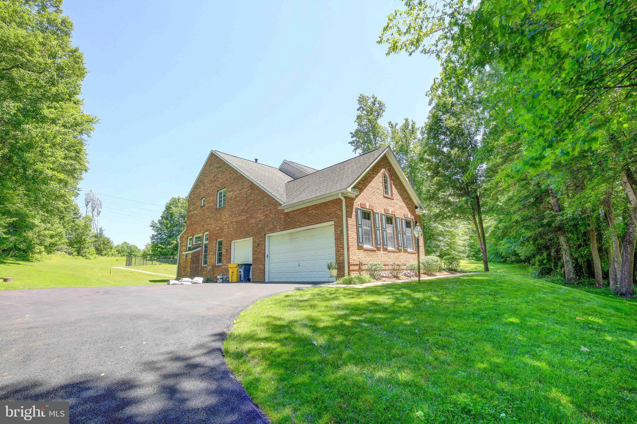 2023 Gresham Lane Davidsonville, MD 21035 - Photo 4 of 58 Large, side loading garage