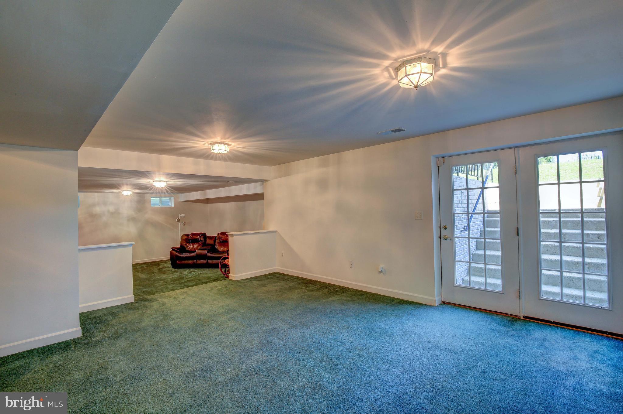 2023 Gresham Lane Davidsonville, MD 21035 - Photo 48 of 58 French doors walk-out to the backyard