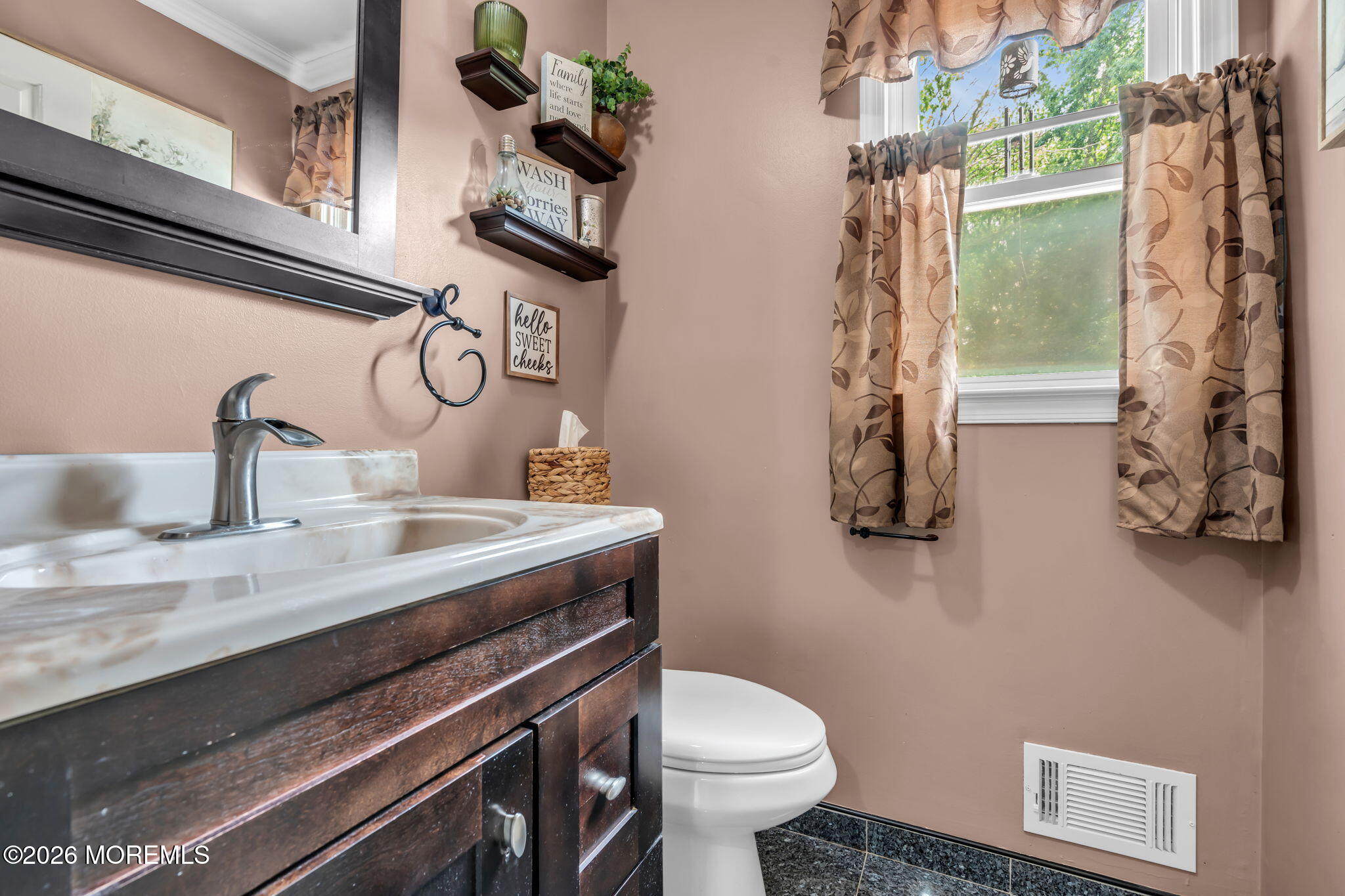 21 Ryan Road Marlboro, NJ 07746 - Photo 14 of 56 a bathroom with a granite countertop sink a toilet and a shower curtain
