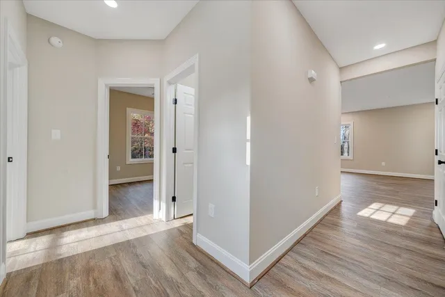 a view of kitchen with wooden floor and window