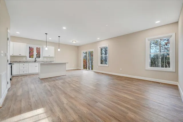 a view of kitchen with wooden floor
