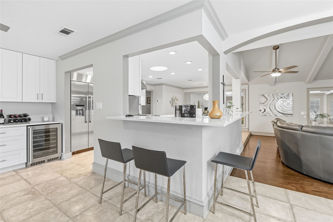 11405 Antler Lane Austin, TX 78726 - Photo 28 of 29 a kitchen with cabinets and chairs
