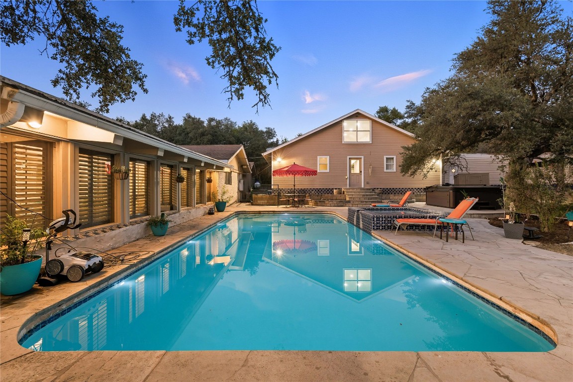 11405 Antler Lane Austin, TX 78726 - Photo 26 of 29 a view of a house with a swimming pool