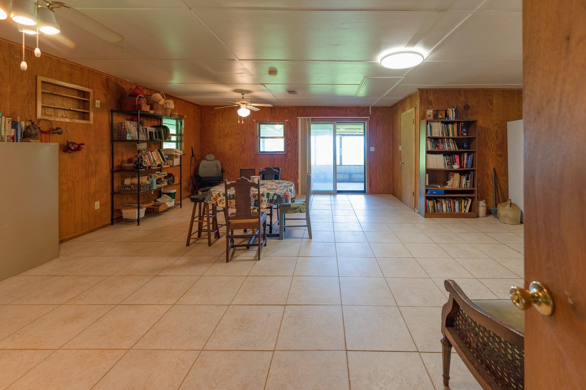 980 Hill Farm Road Coldspring, TX 77331 - Photo 9 of 22 Family room looks out to lake