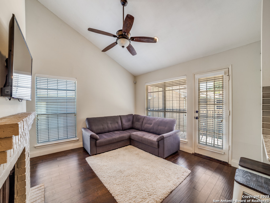 8655 Datapoint, Unit 802 San Antonio, TX 78229 - Photo 1 of 1 a living room with furniture and a flat screen tv