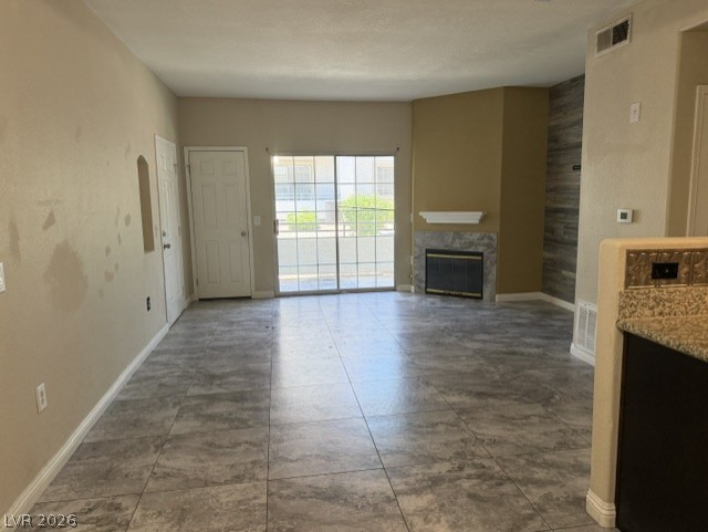 3318 North Decatur Boulevard, Unit 1163 Las Vegas, NV 89130 - Photo 4 of 35 A generously sized living area boasts a fireplace and large sliding glass doors.