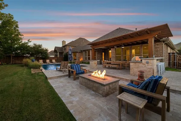 a outdoor living space with furniture and garden