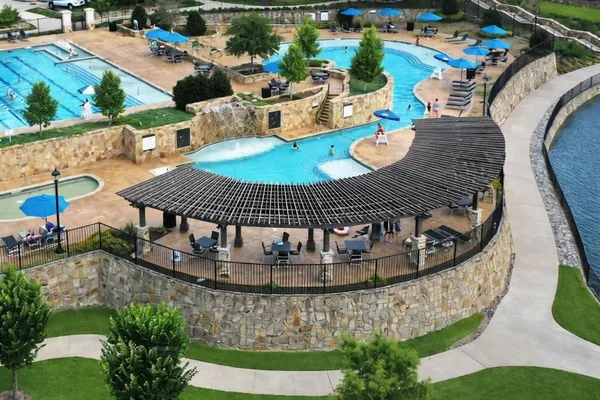 a view of a swimming pool and outdoor space