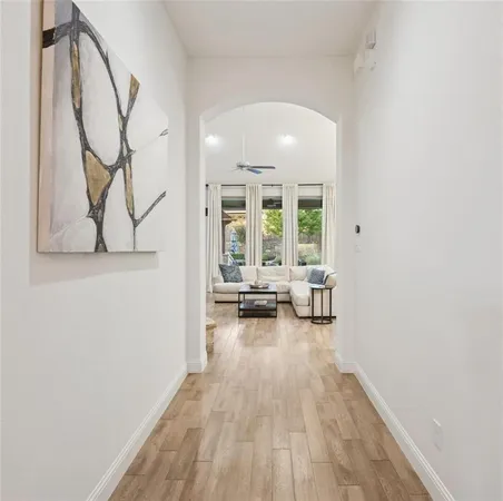a view of a living room and a wooden floor