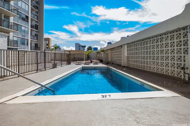 a view of swimming pool with patio