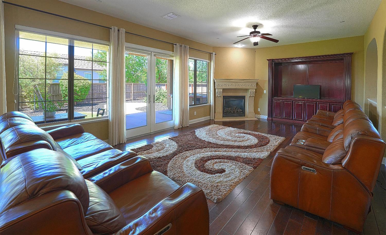 1340 Bella Circle Lincoln, CA 95648 - Photo 14 of 97 a living room with furniture and a fireplace