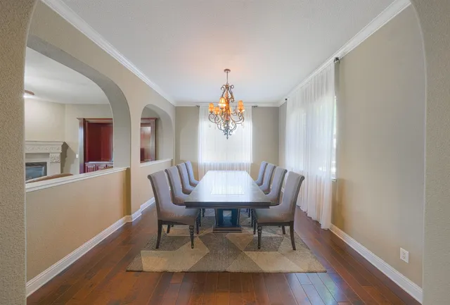 a bedroom with a bed and cabinet