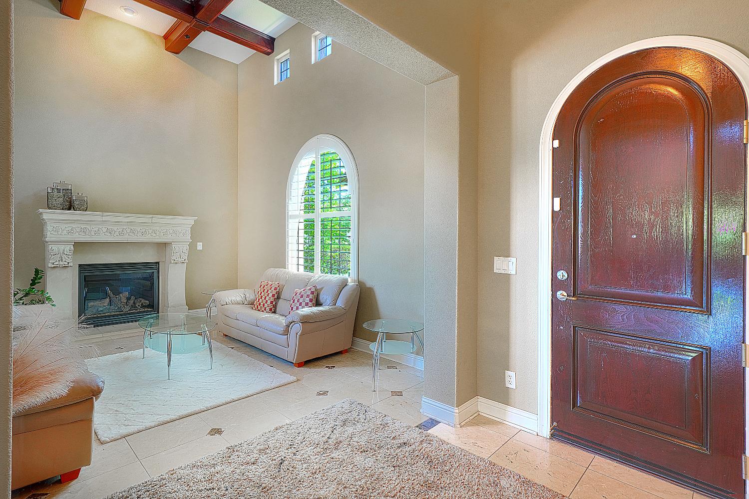 1340 Bella Circle Lincoln, CA 95648 - Photo 4 of 97 a living room with furniture and a fireplace