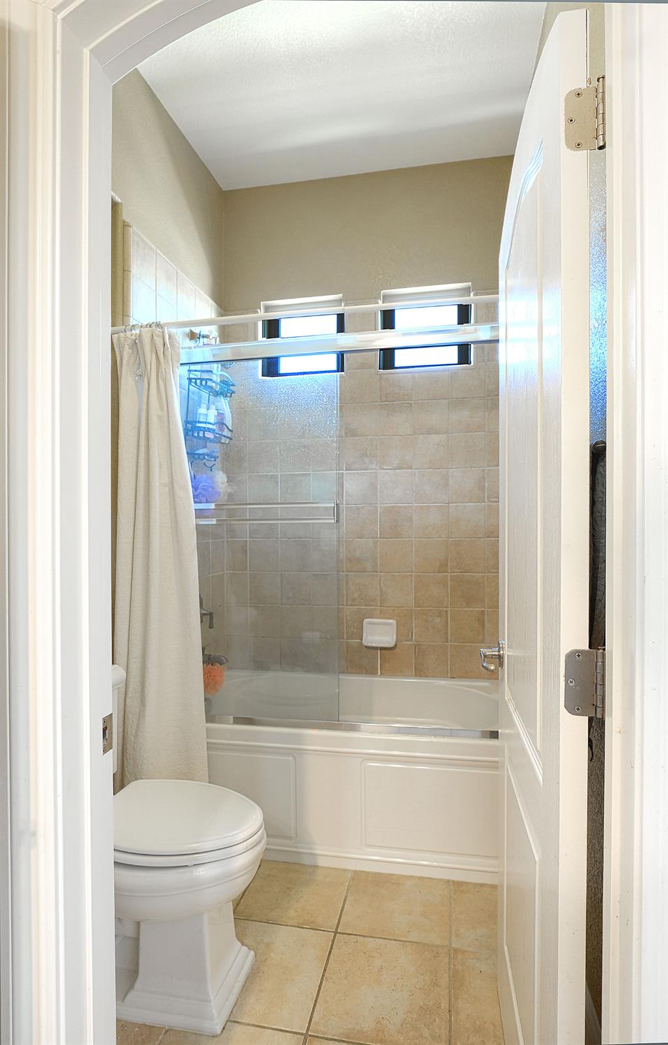 1340 Bella Circle Lincoln, CA 95648 - Photo 43 of 97 a bathroom with a shower a toilet and a bathtub