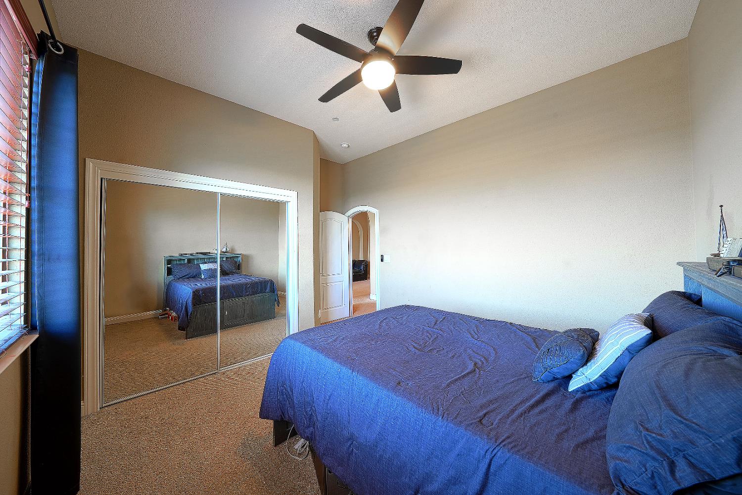 1340 Bella Circle Lincoln, CA 95648 - Photo 45 of 97 a bed room with a bed and a chair