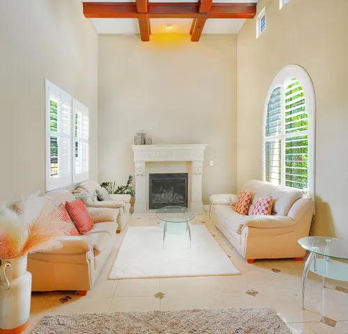 a large kitchen with a table and chairs