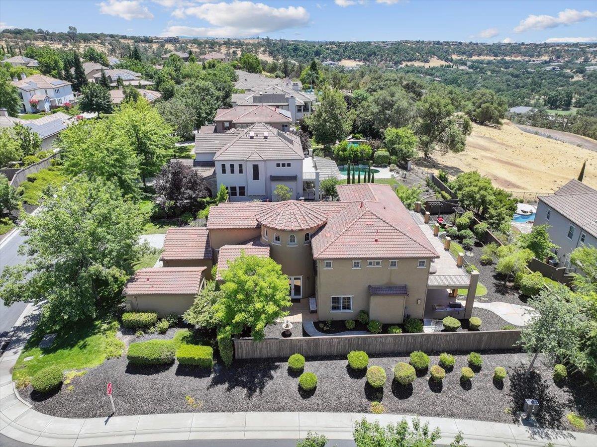 1340 Bella Circle Lincoln, CA 95648 - Photo 70 of 97 an aerial view of a house with a garden and lake view