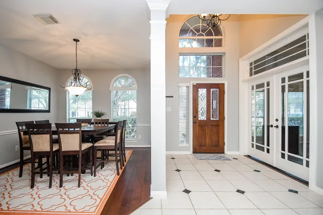 a view of a dining room with furniture window and outside view