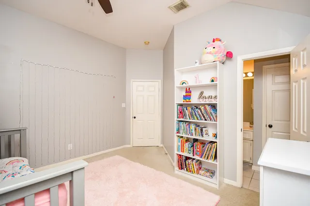a room with a book shelf