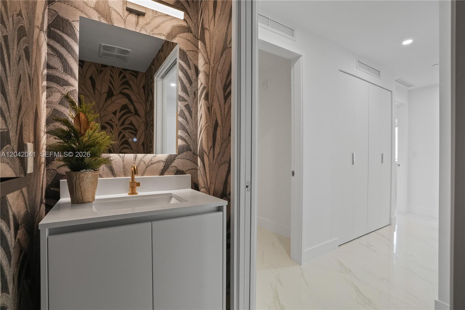 700 Northeast 24th Street, Unit 3905 Miami, FL 33137 - Photo 22 of 46 Half Bathroom