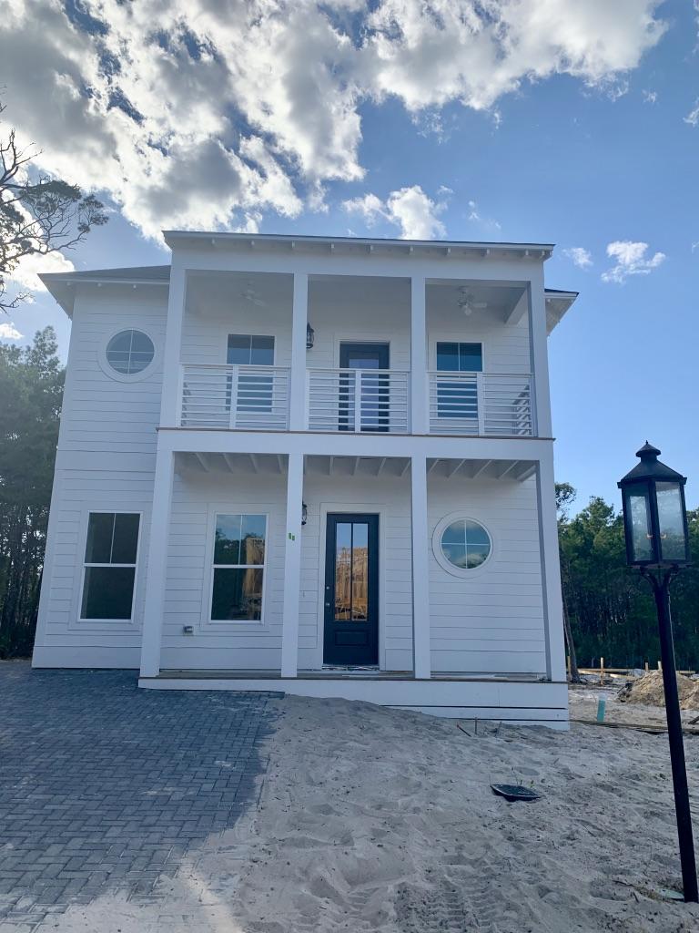 96 Beach View Dr Inlet Beach Inlet Beach, FL 32461 - Photo 1 of 13 a view of a house with a yard