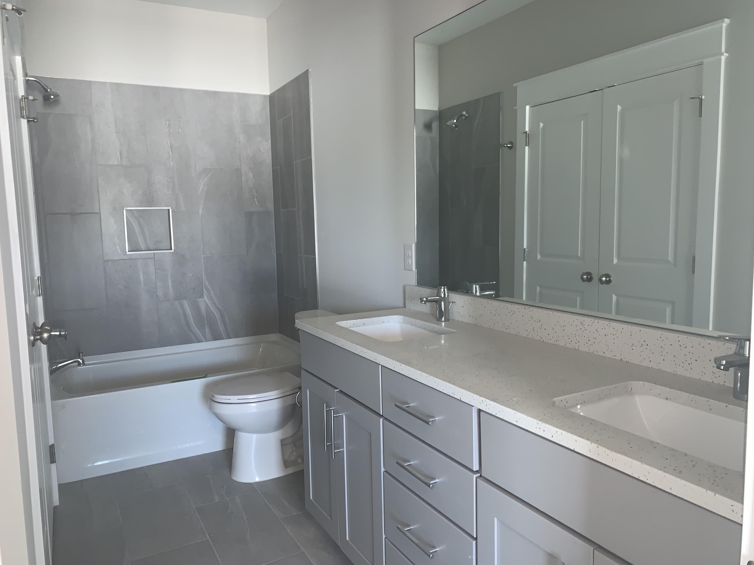 96 Beach View Dr Inlet Beach Inlet Beach, FL 32461 - Photo 11 of 13 a bathroom with a sink a toilet and shower