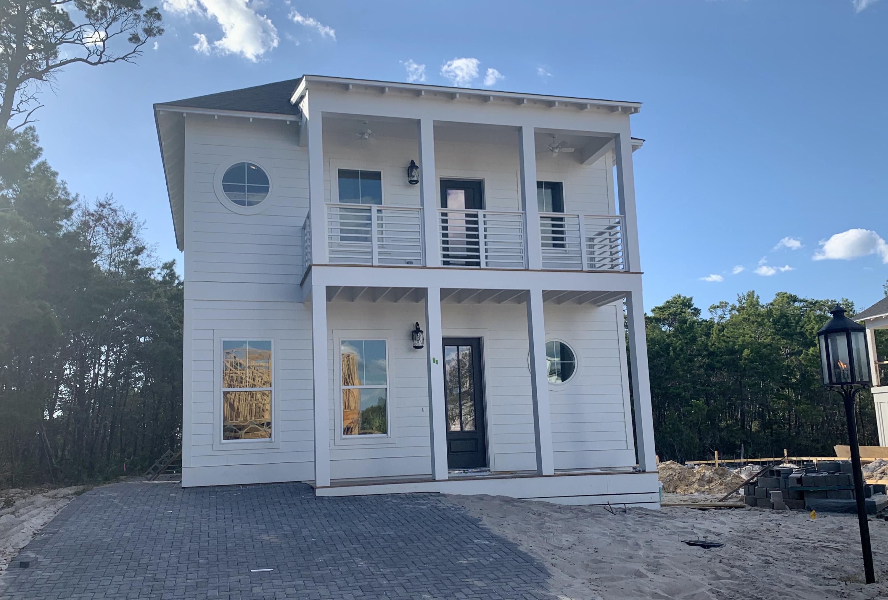 96 Beach View Dr Inlet Beach Inlet Beach, FL 32461 - Photo 2 of 13 a view of a house with a patio