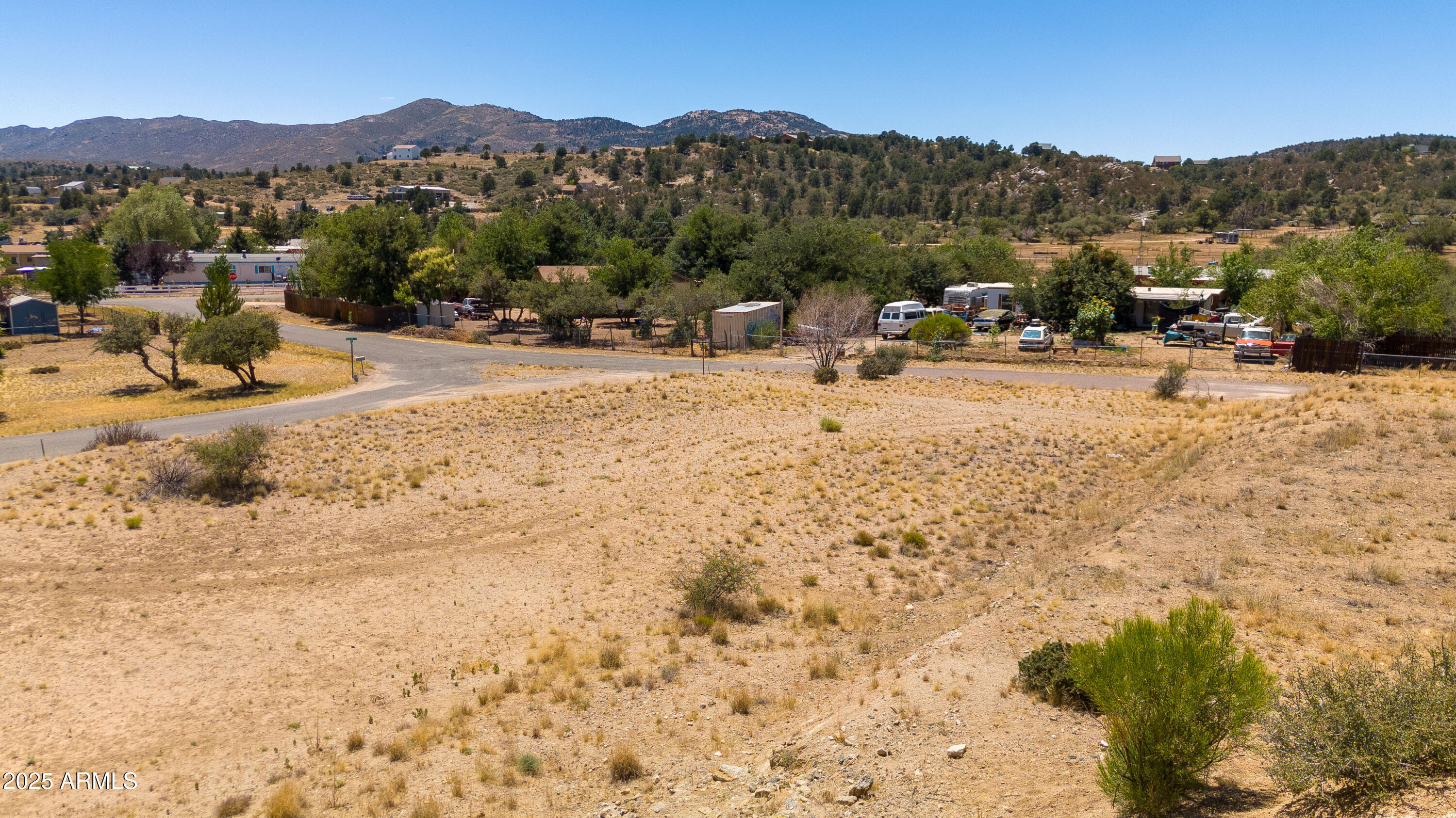 18108 Double Tree Road, Unit 227 Kirkland, AZ 86332 - Photo 5 of 7 a view of a town with mountains in the background