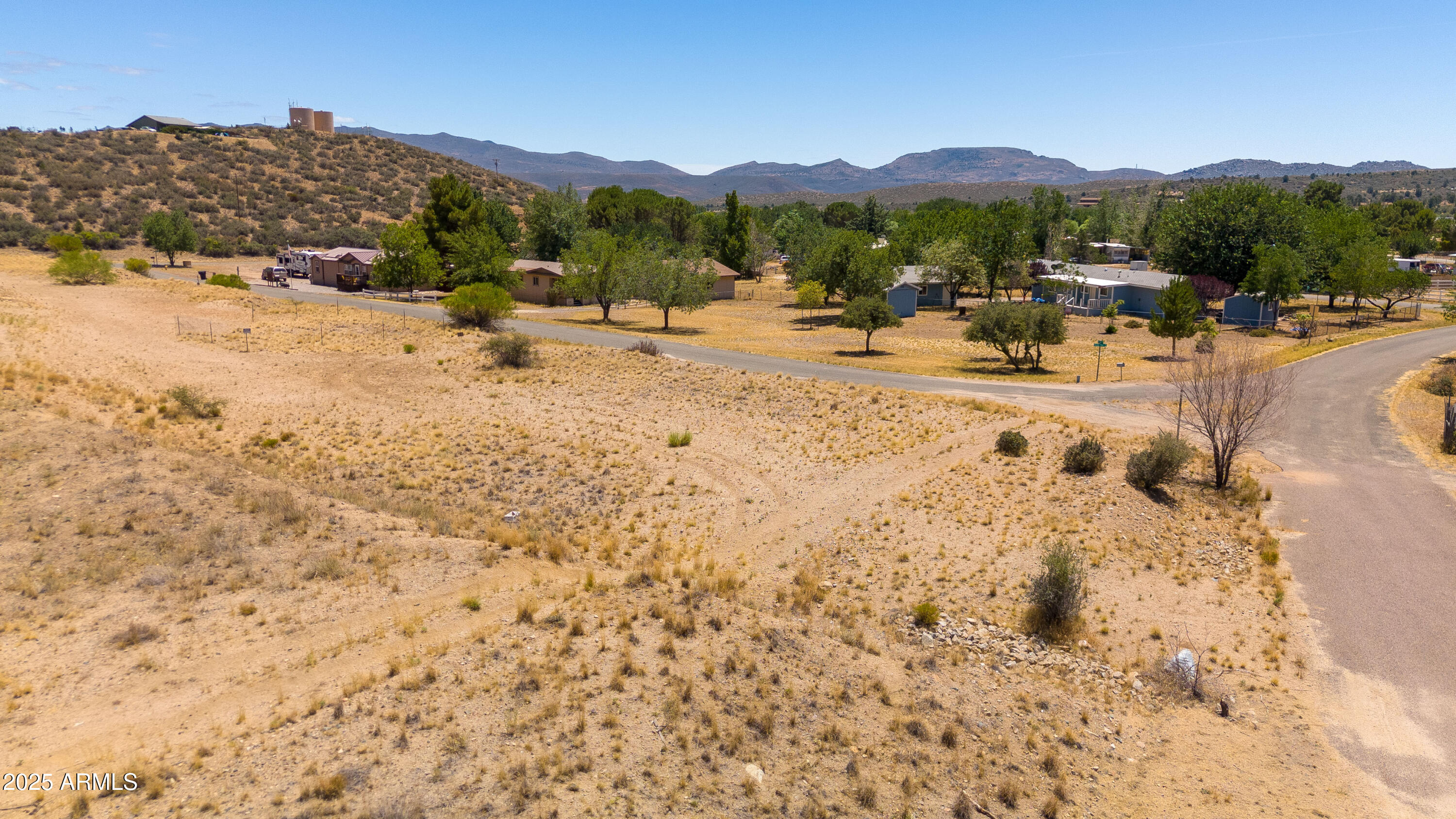 18108 Double Tree Road, Unit 227 Kirkland, AZ 86332 - Photo 6 of 7 a view of a lake with a mountain