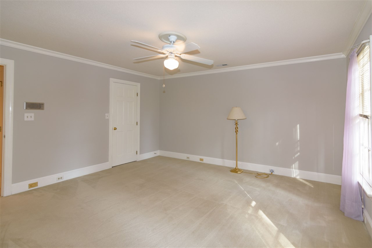2808 Combe Hill Trail Raleigh, NC 27613 - Photo 25 of 30 This spacious bedroom is ready to be your go to for me time and is complete with an amazing view Bedroom