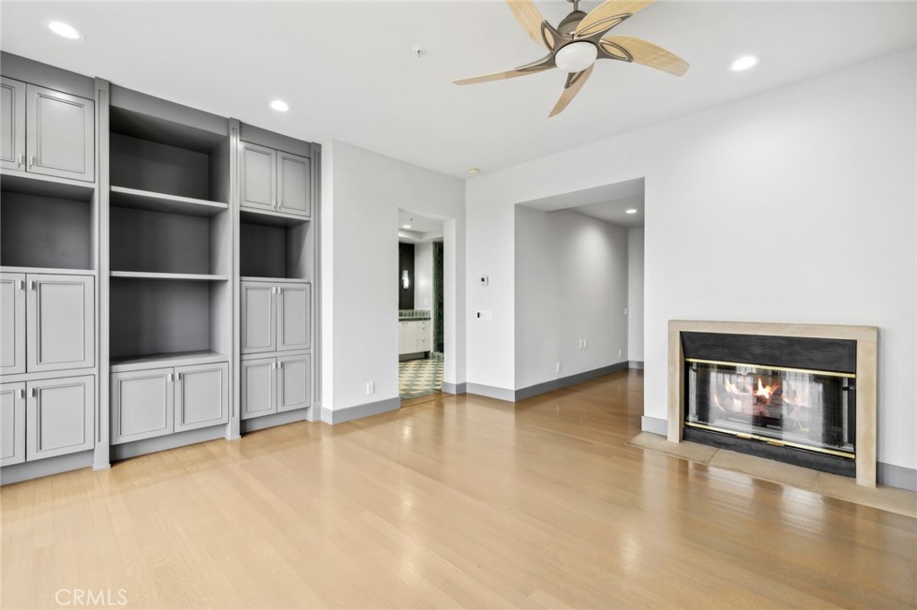 5 Torrey Pine Drive Newport Coast, CA 92657 - Photo 12 of 26 a view of an empty room with a fireplace and a window