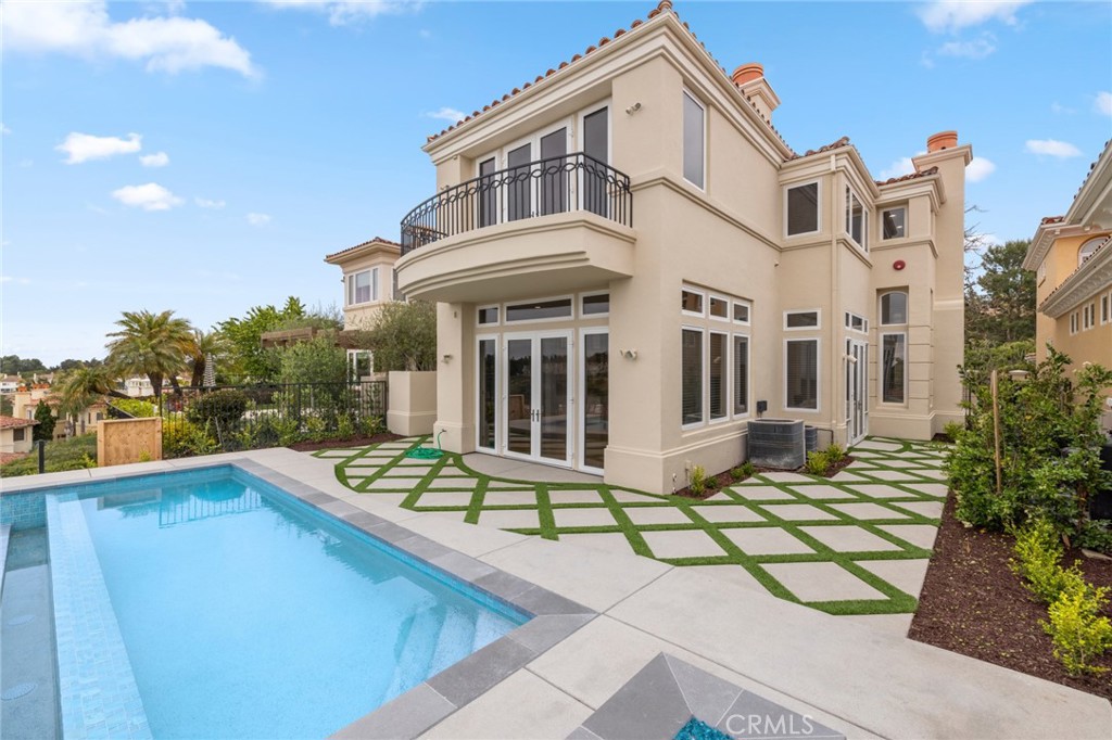 5 Torrey Pine Drive Newport Coast, CA 92657 - Photo 22 of 26 a front view of a house with garden